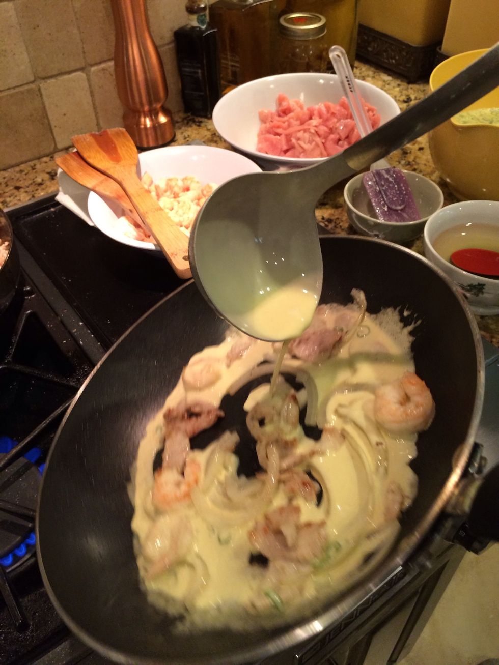 Pour in batter while turning the batter to distribute batter evenly.