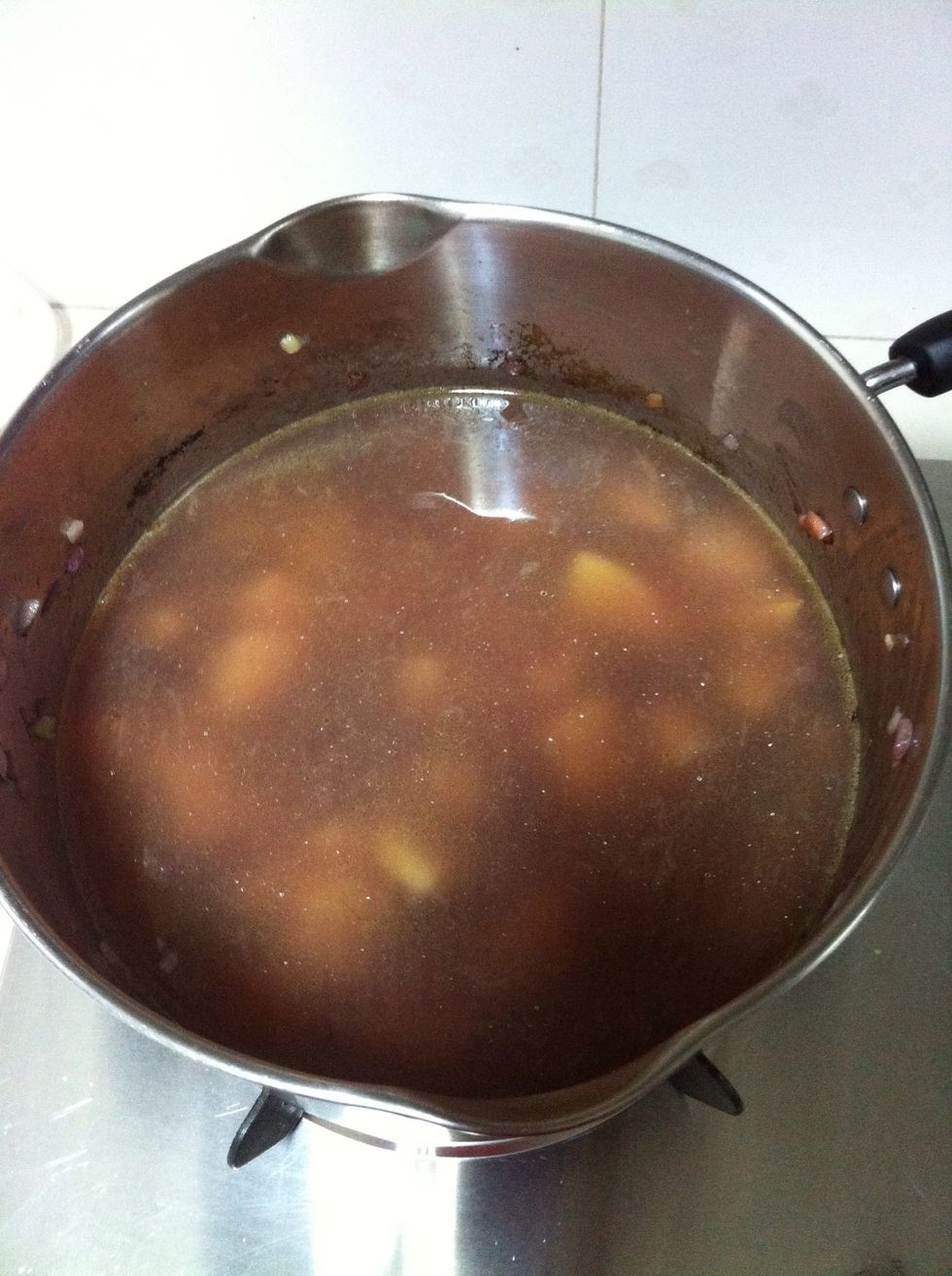 Pour in chicken broth (salted or u can salt it now), bring to boil and wait till potatoes are ready (approx. 20 min).