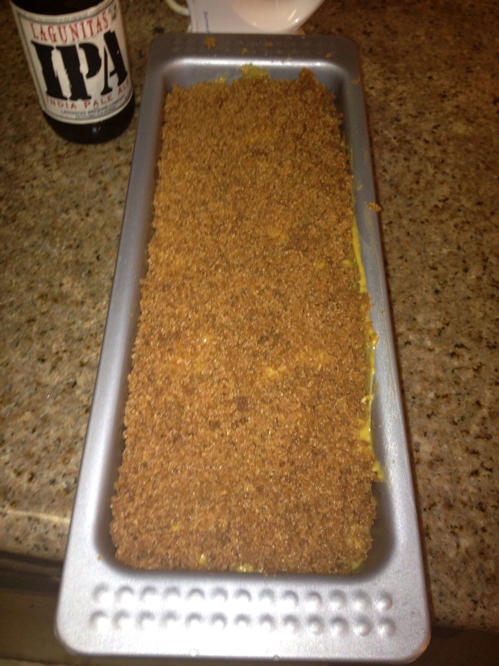 Pour in greased pan and top with streusel