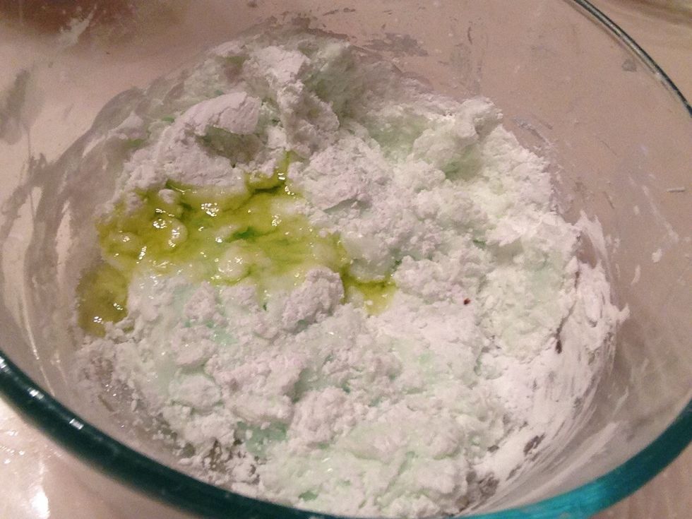 Pour in olive oil after being mixed for a little bit