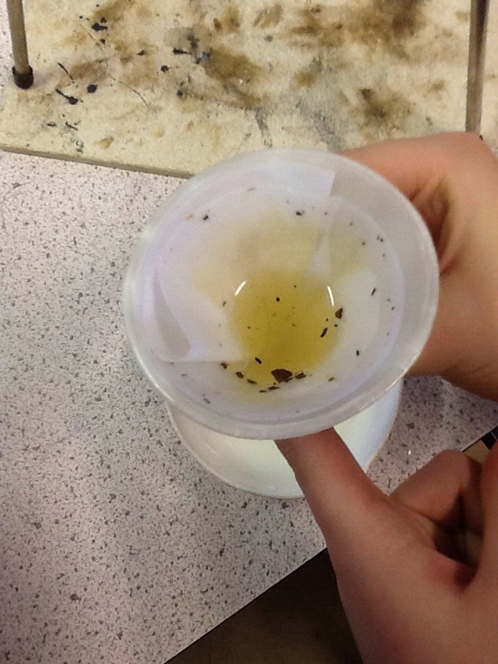 Pour in some sea water in the flask and then place the flask over a evaporation dish... And tap gently...