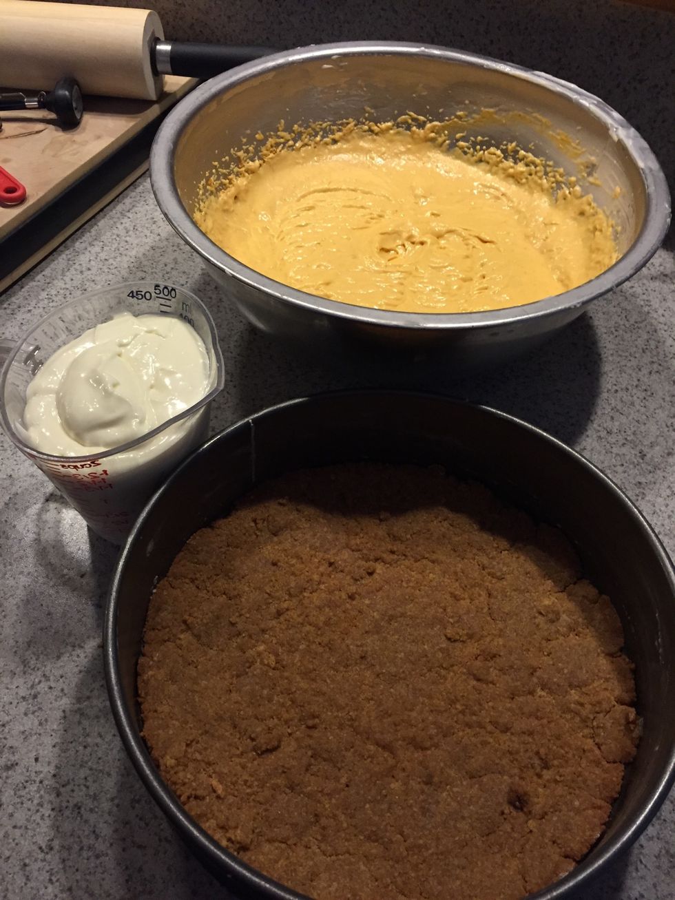 Pour in the 1-1/2 cup of filling you set aside on the crust. Spread it evenly, then add the rest of the filling on top. Bake for 1 hour and let it cool for 3-5 hours before serving.