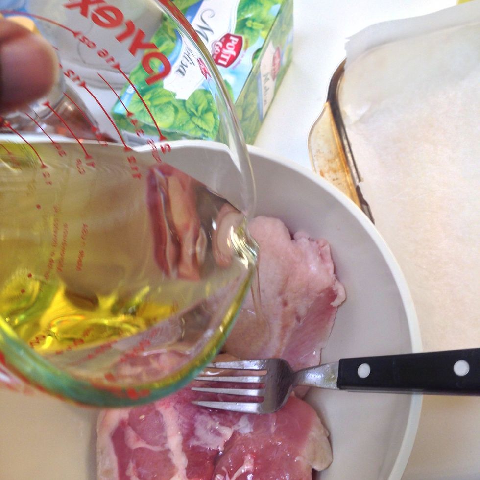 Pour in the 1/2 cup olive oil.