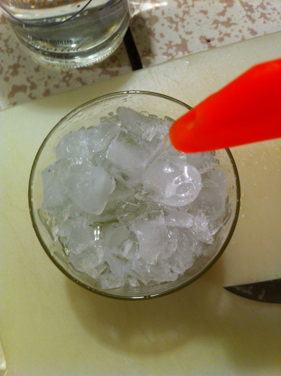 Pour in the brazilian rum. I'm using Cabana.