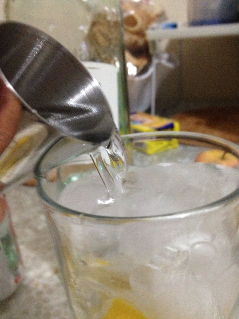 Pour in the rum.