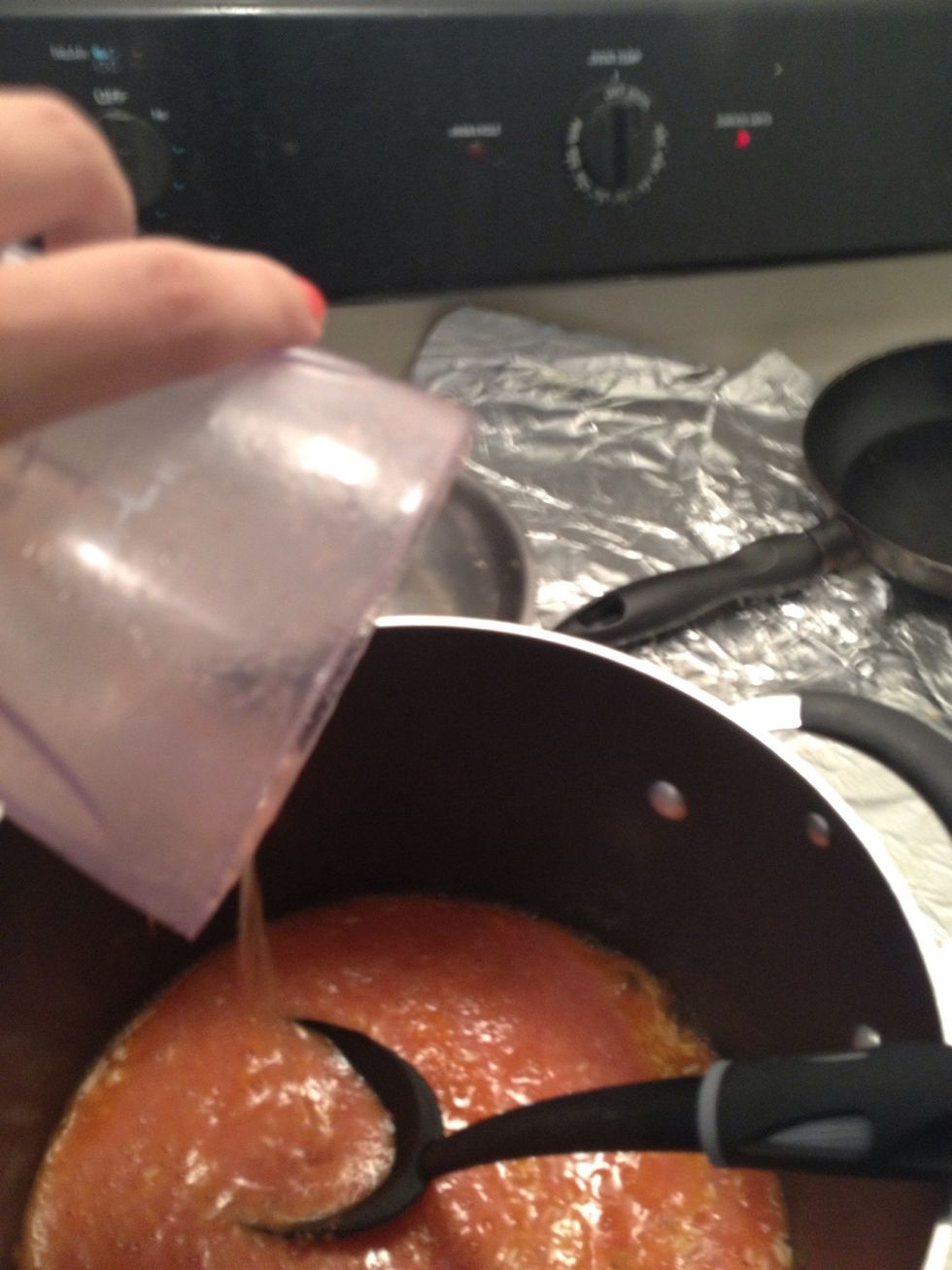 Pour in the sauce when you get ideal toastedness! Ratio is usually 1:2 rice to liquid so I used a totally of 4 cups liquid here, 2 sauce, 2 water
