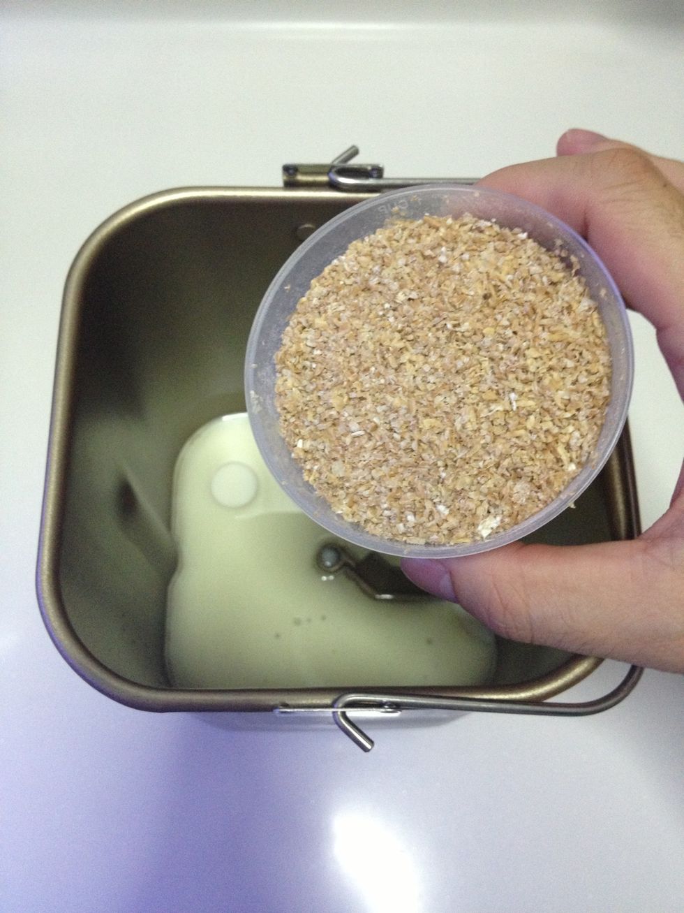 Pour in the wholemeal flour.