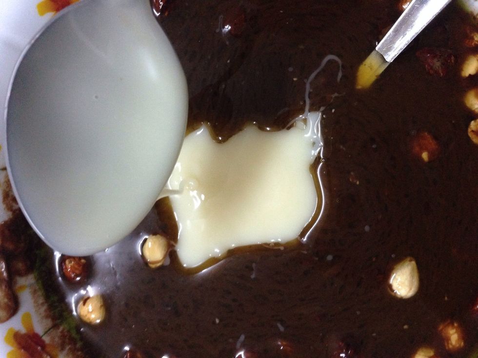 Pour in three big spoons of condensed sweetened milk