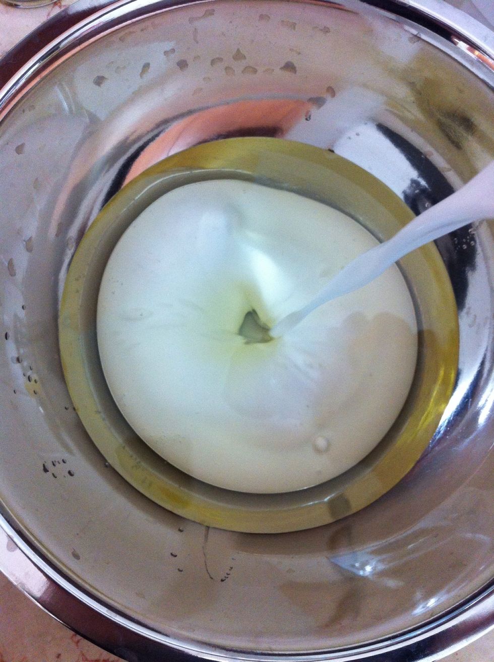 Pour in to a bowl oil and coconut milk