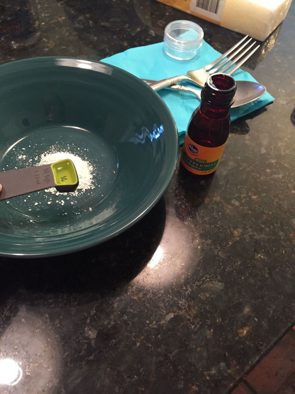 Pour in two one fourths of peppermint extract into the mixture