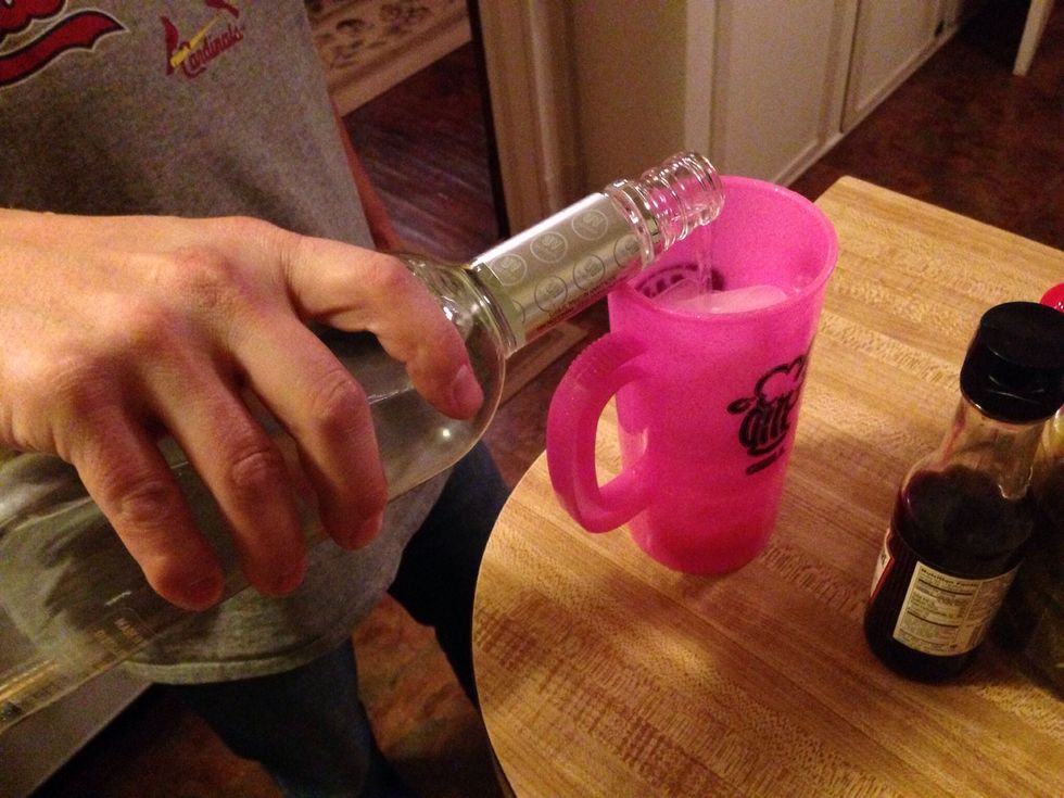 Pour in vodka of your choice. Amount and strength is really up to you and how good or bad of day you've had...