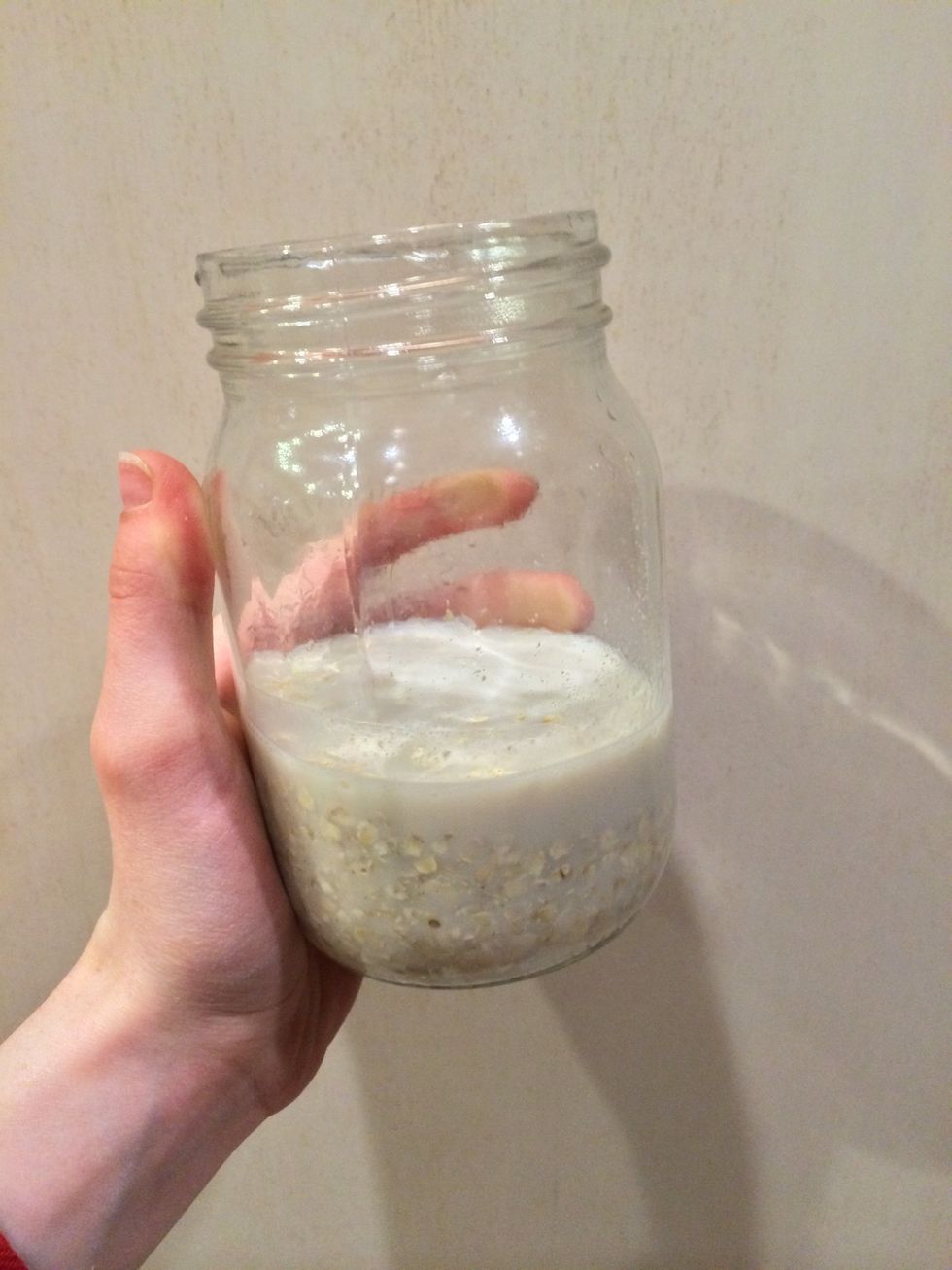 Pour in your almond milk (or any type of milk that you like best). Optional: Adding Greek yogurt will also make the oatmeal more thick and creamy.