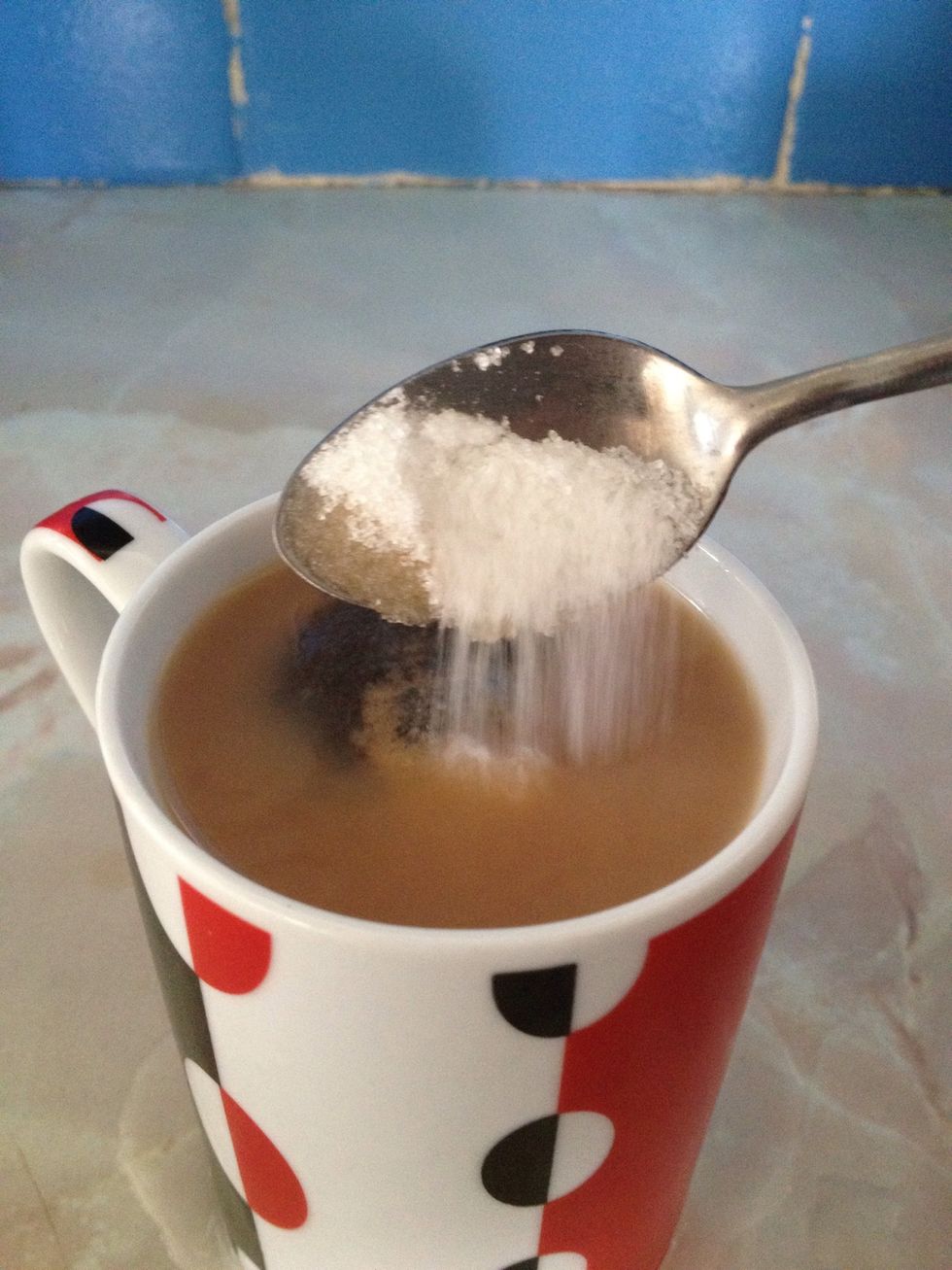 Pour in your desired amount of sugar/sweetner in with a tea spoon. just one for me but you can add two or more but be carful not to put to many in this can result in your tea tasting of sugar water.