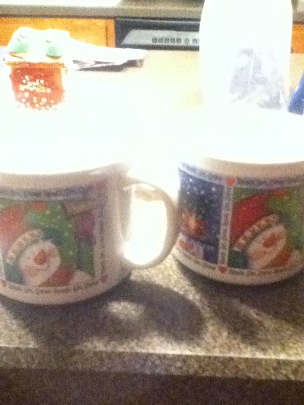 pour into 2 wide, or small cups but not a juice glass and make sure the have been sprayed with cooking spray