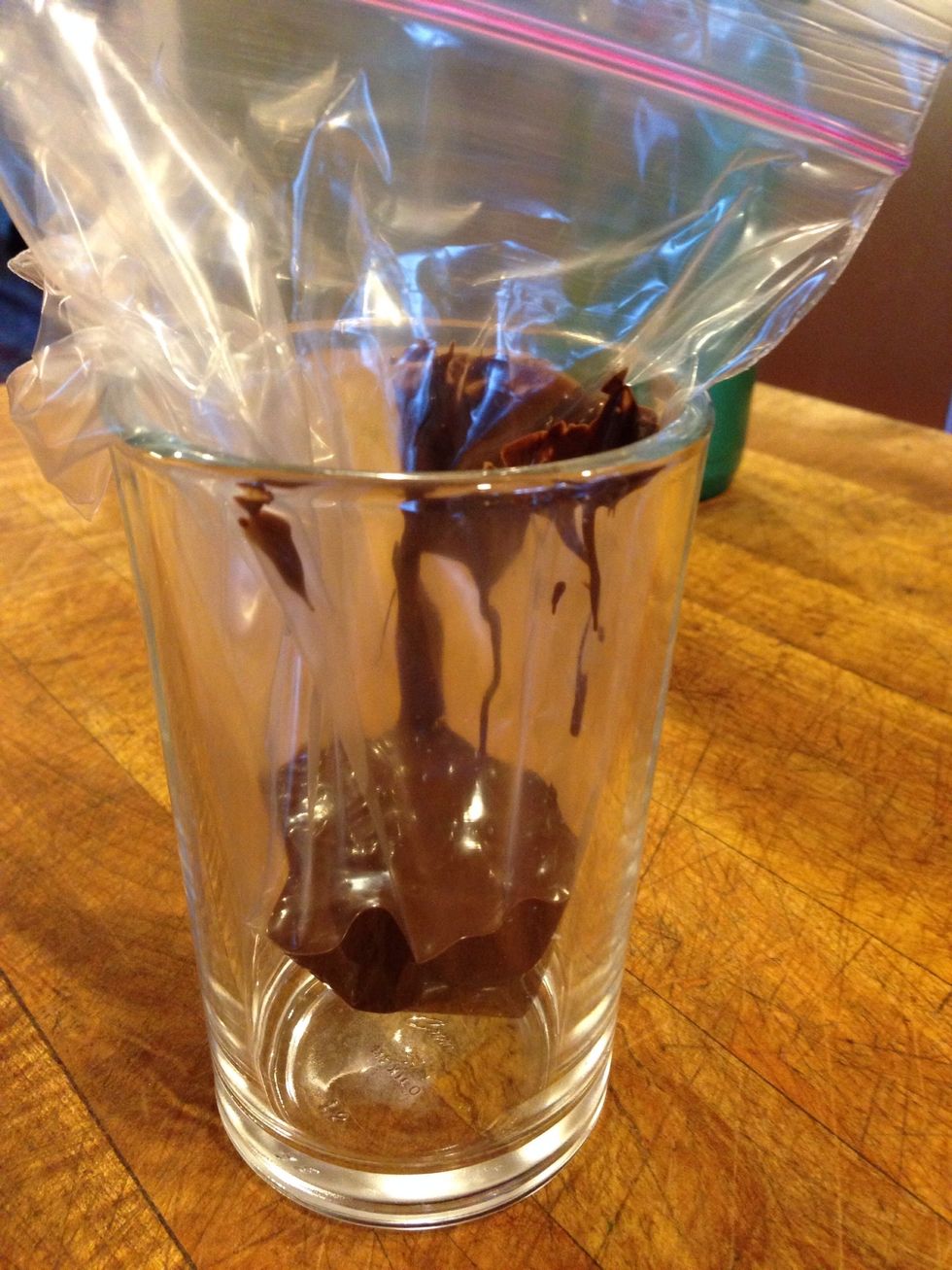 Pour into a little baggy, or a piping bag if you want to get fancy! Cut off a tiny corner.