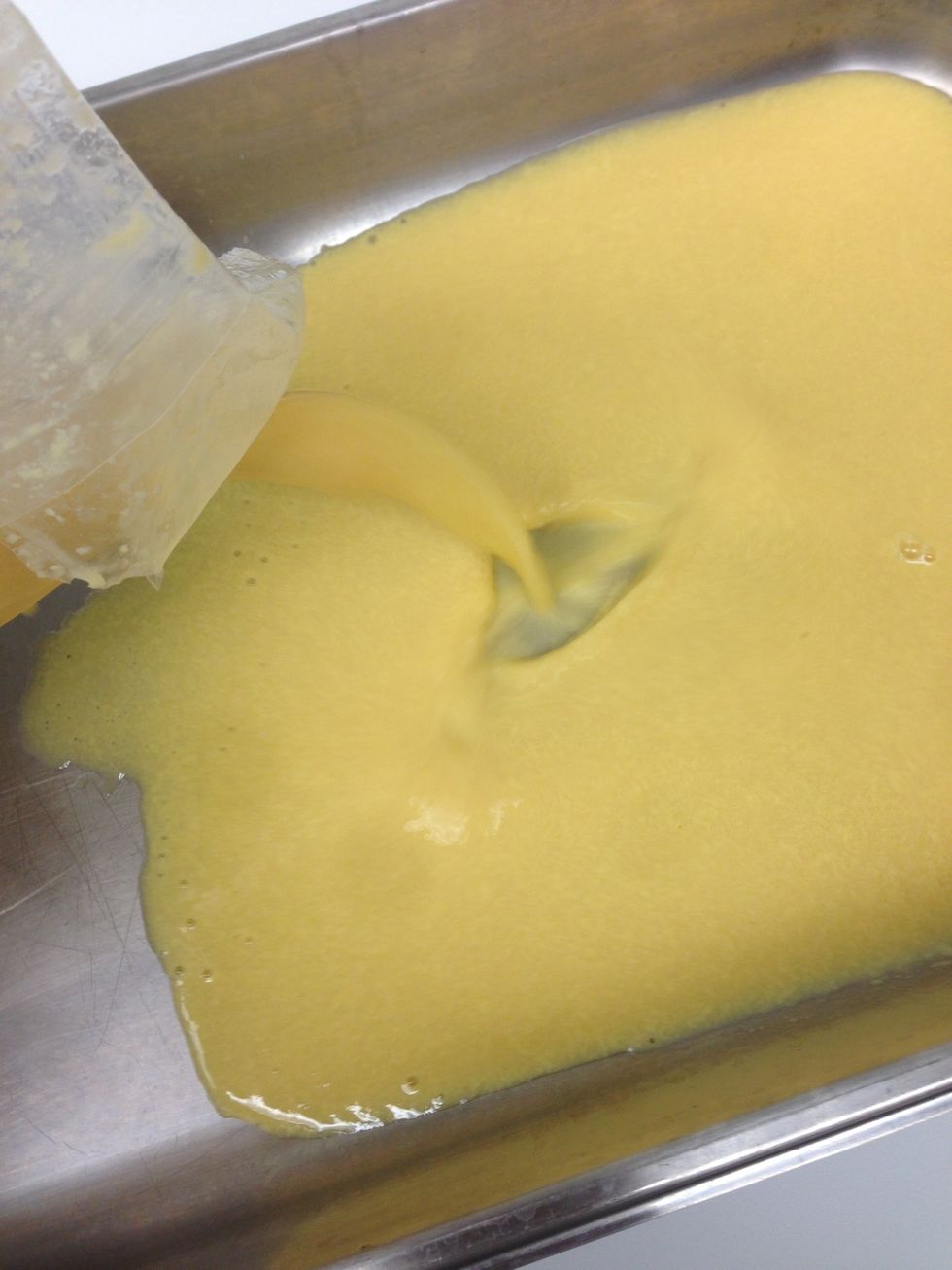 Pour into a steam table pan. Season