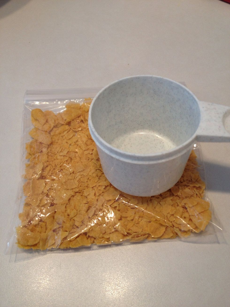Pour into a ziplock bag and crush flakes using the back of your measuring cup.