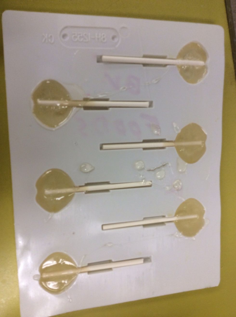 Pour into lollipop molds. *Note that clear chocolate molds will MELT. Use the opaque molds for hot sugar.