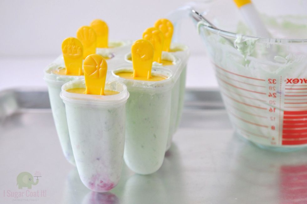 Pour into molds and insert stick. Freeze for at least six hours.