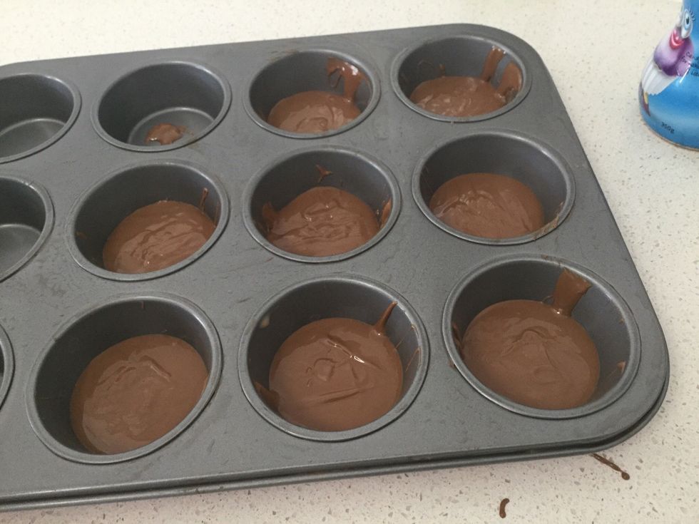 Pour into muffin tray evenly, covering the bottom surface. Make sure it's not to thick.