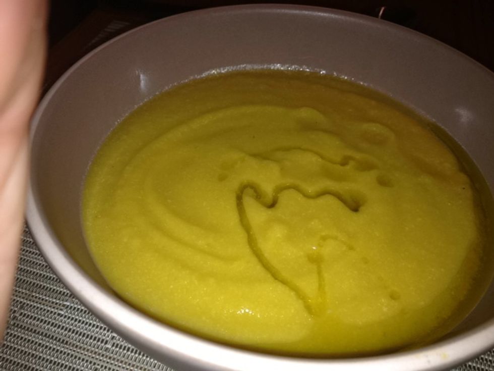 Pour into soup bowls, and swirl a little olive oil on top.