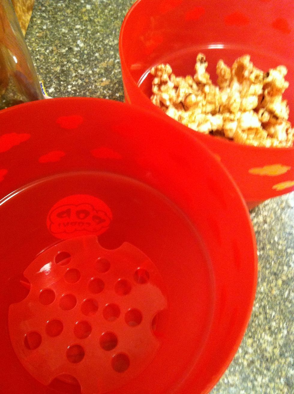 Pour into super cute popcorn bowls designed to separate the unpopped kernels.