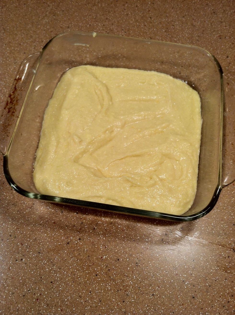 Pour into the greased pan and spread the batter out evenly.