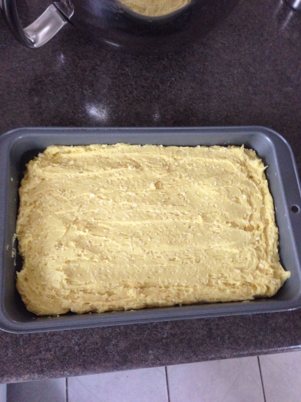 Pour into your greased baking dish, and spread evenly. I've used a 10 1/4" X 7" pan. Bake for 25 minutes. The top should be lightly browned, and a toothpick should come out clean.