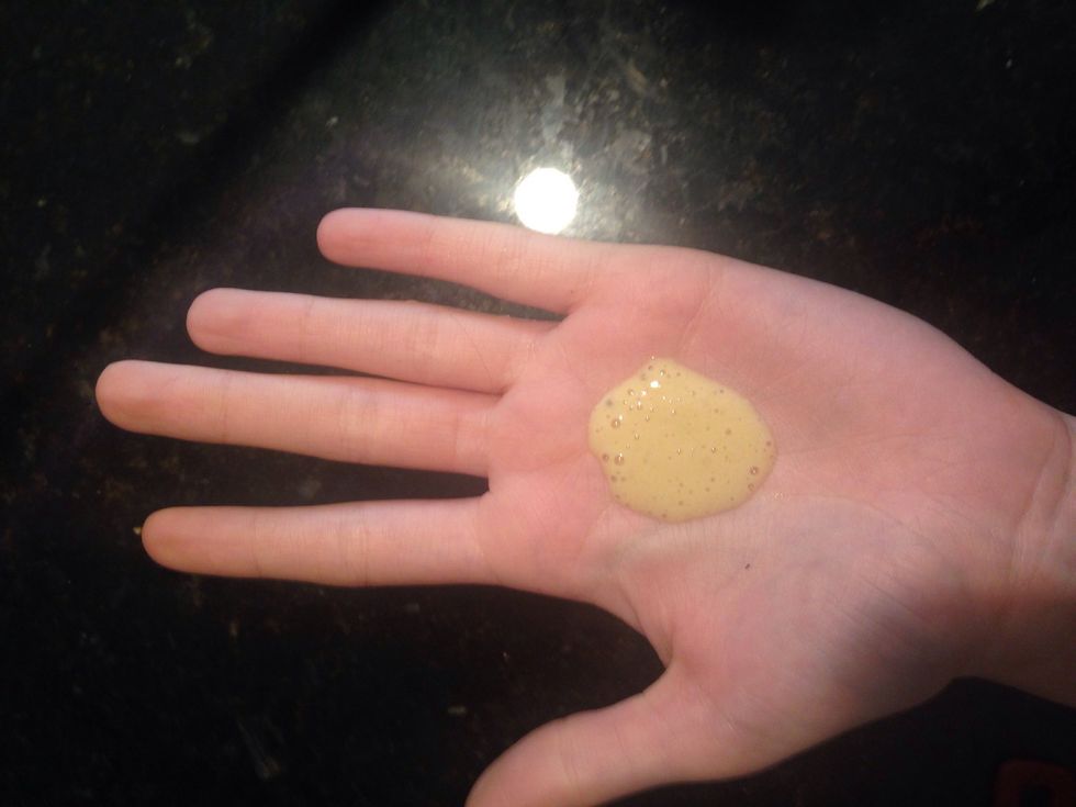 Pour into your hand and work through hair.