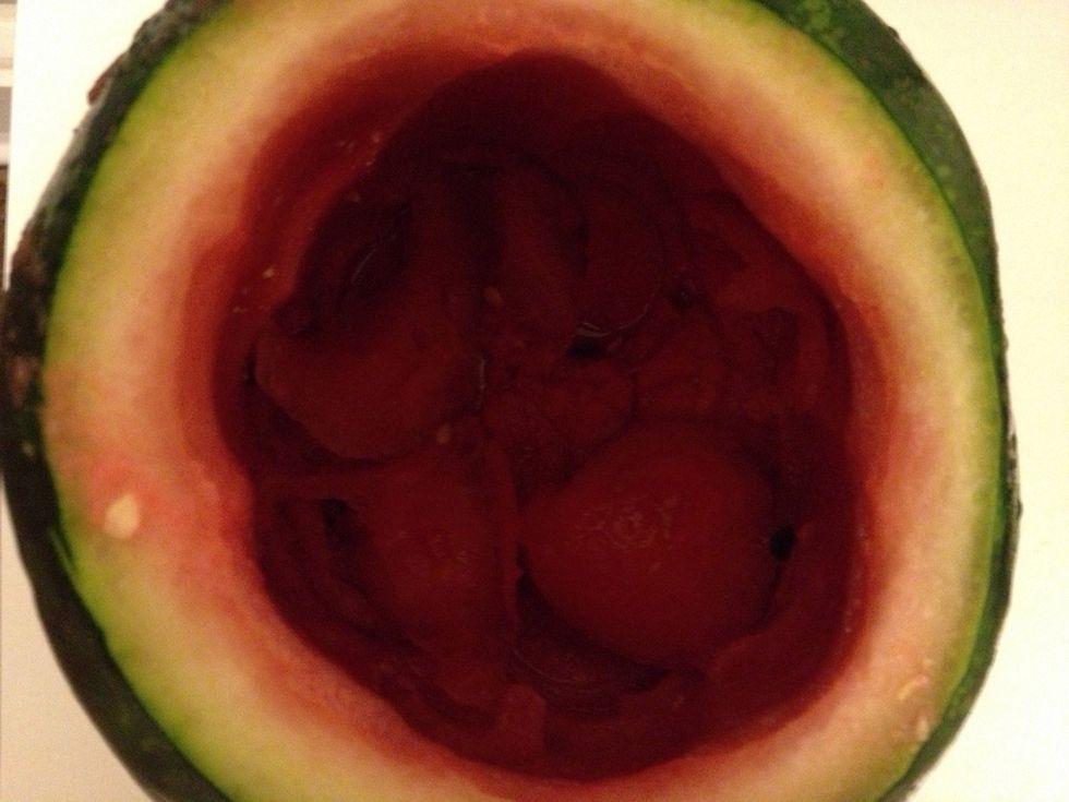 Pour juice into a pitcher. Place reserved watermelon meat back into the cavity  and blend again.