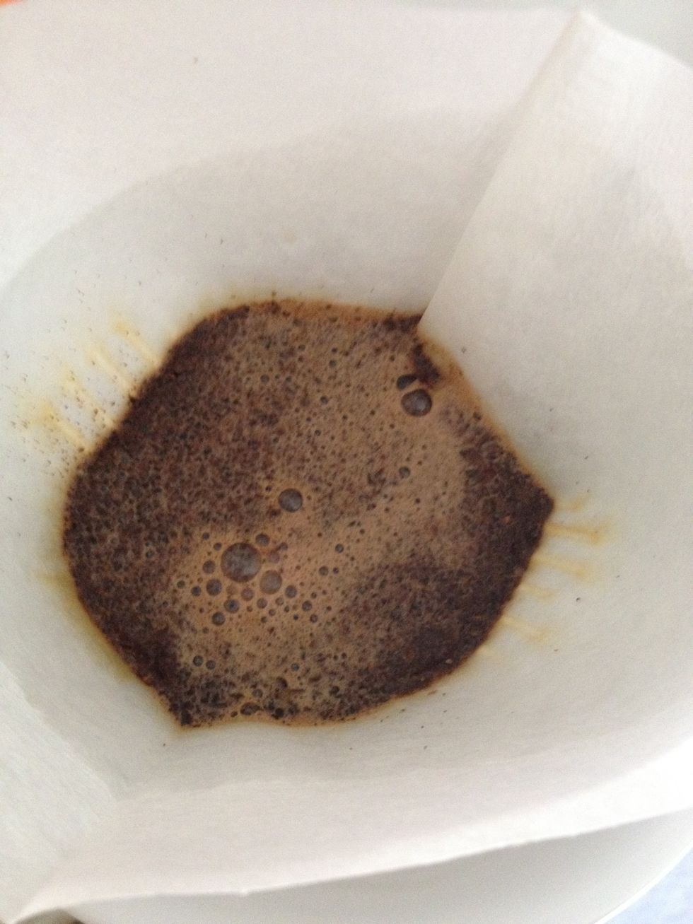 pour just enough water to over grounds. let it expand and offgas.