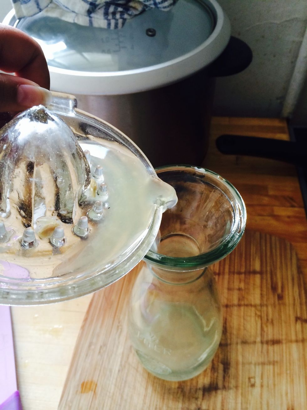 Pour lemon juice into jug