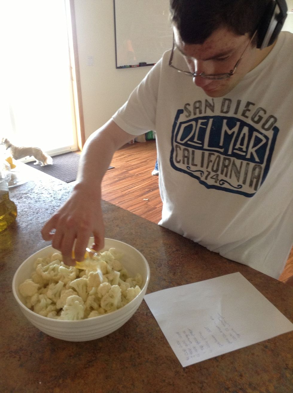 Pour lemon juice over cauliflower