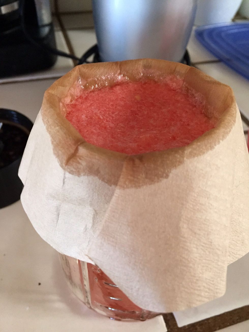 Pour liquified watermelon into sieve to filter out pulp. (I poured it through a coffee filter fitted over a canning jar)