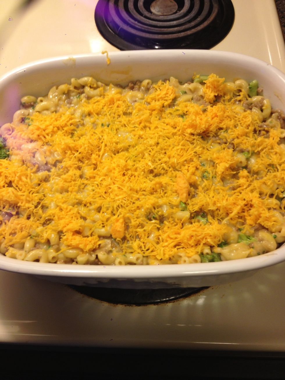 Pour macaroni mixture into a baking dish and top with remaining half a cup of cheese. Bake uncovered in a 350 degree oven for 25-30 minutes.