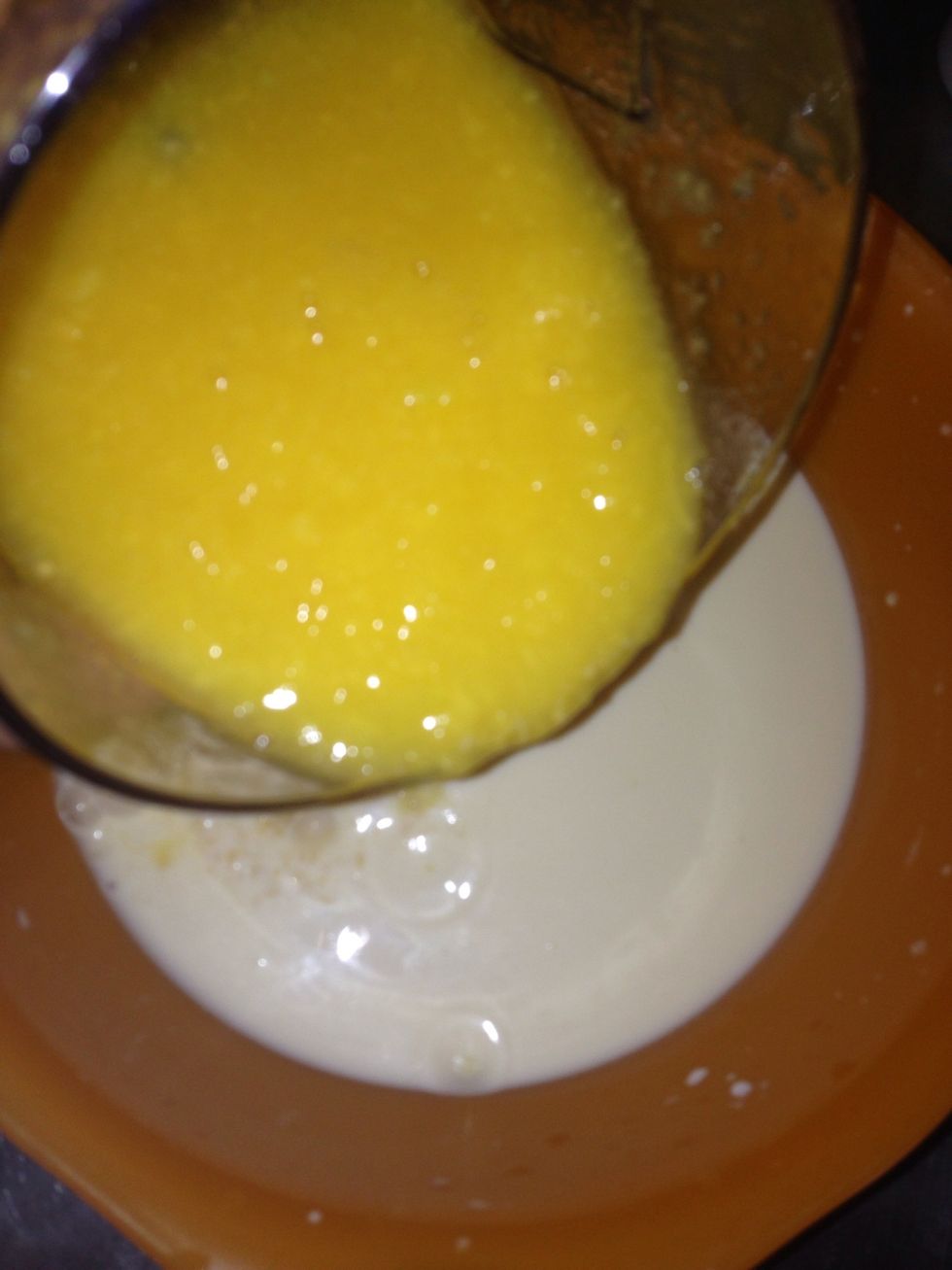 Pour mango smoothies to the milk Bowl.add more condensed milk/ sugar according to your taste.
