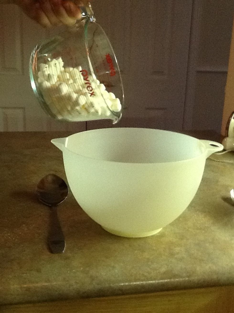 Pour marshmallows into bowl