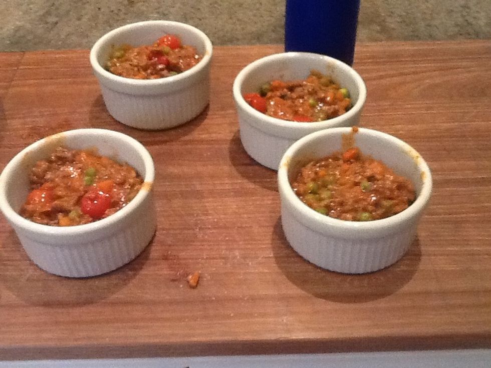 Pour meat mix into bowls.