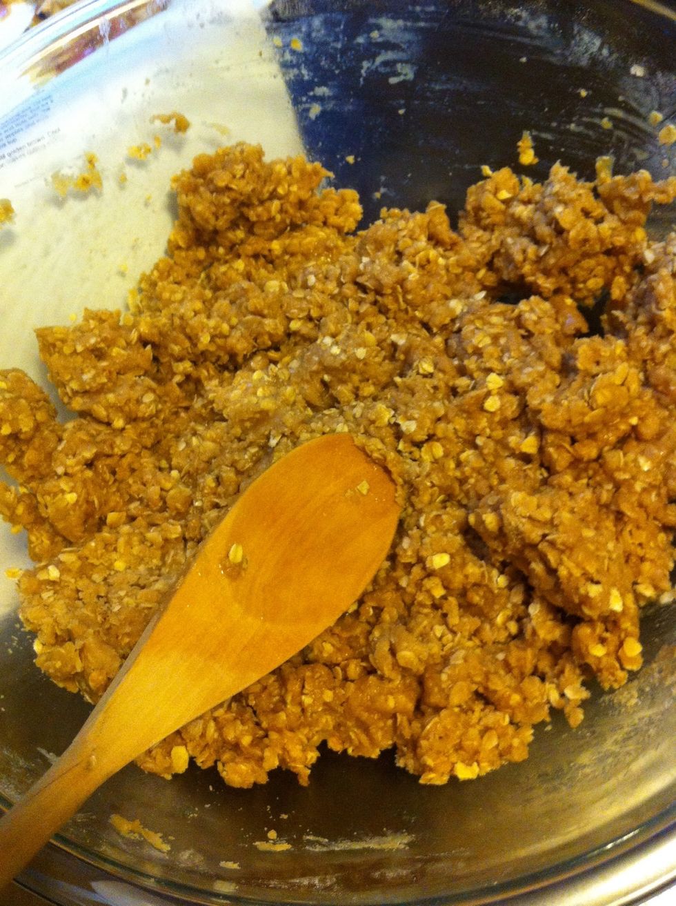 Pour melted butter on top of dry ingredients