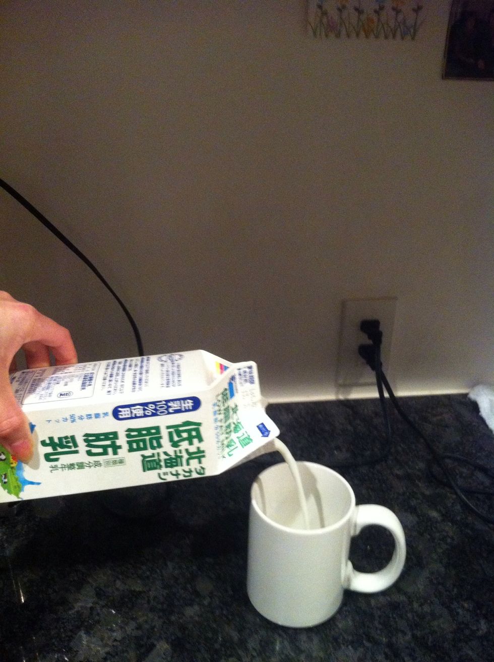 Pour milk into cup and microwave for 2.5 mins