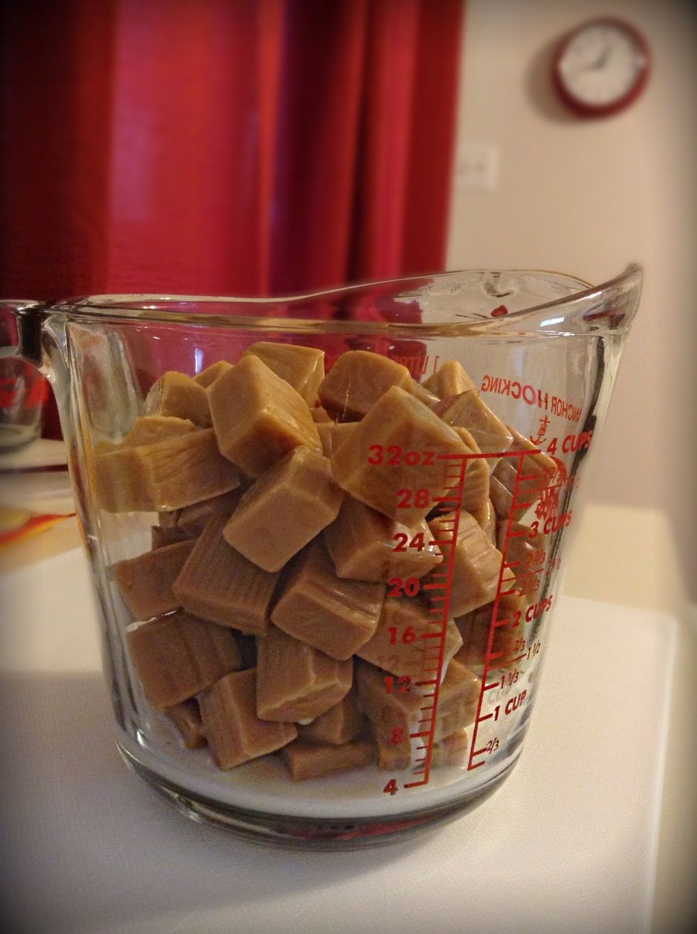 Pour milk into your measuring cup and place in the microwave for one minute.