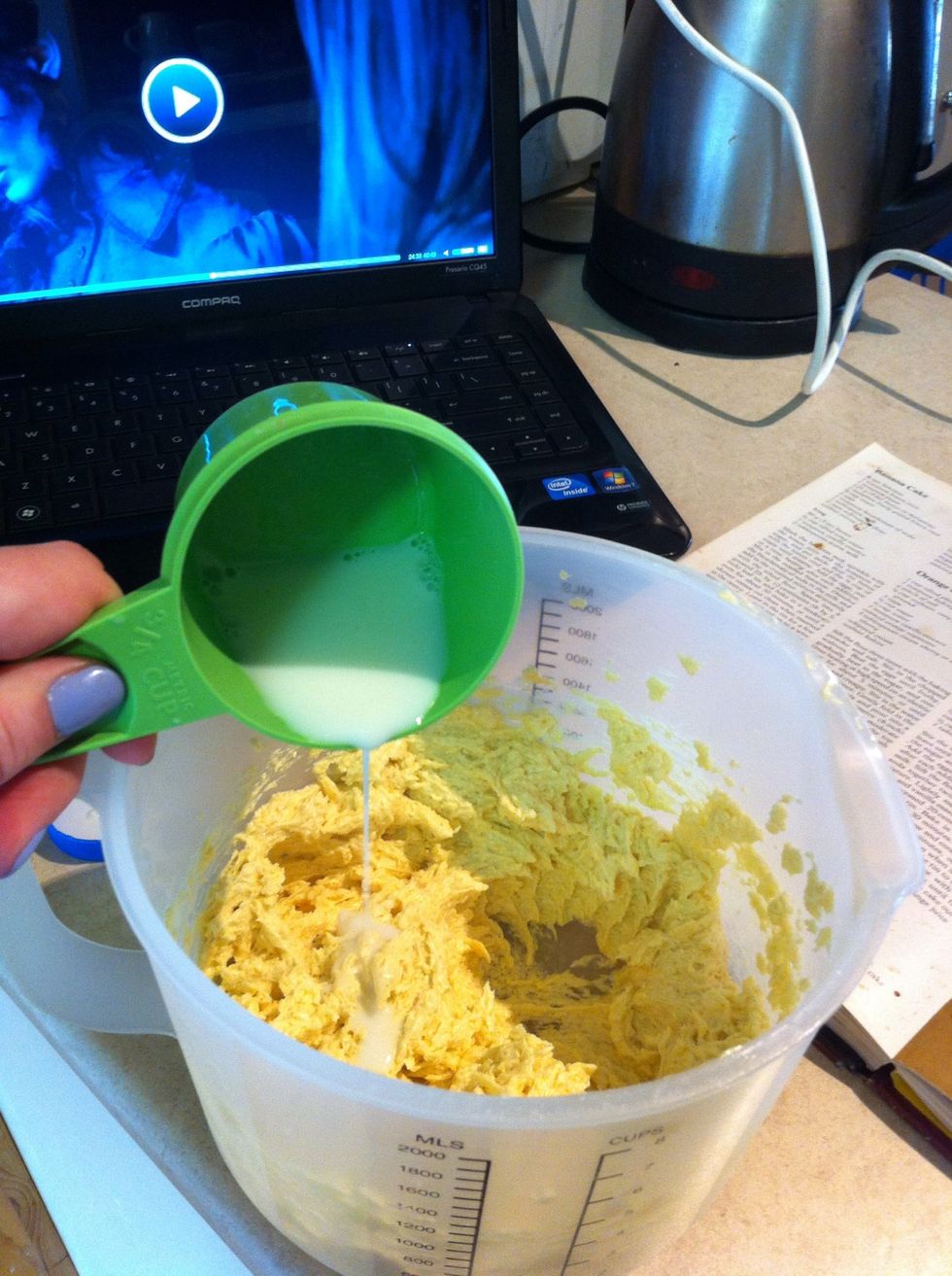 Pour milk mix into creamed butter mix