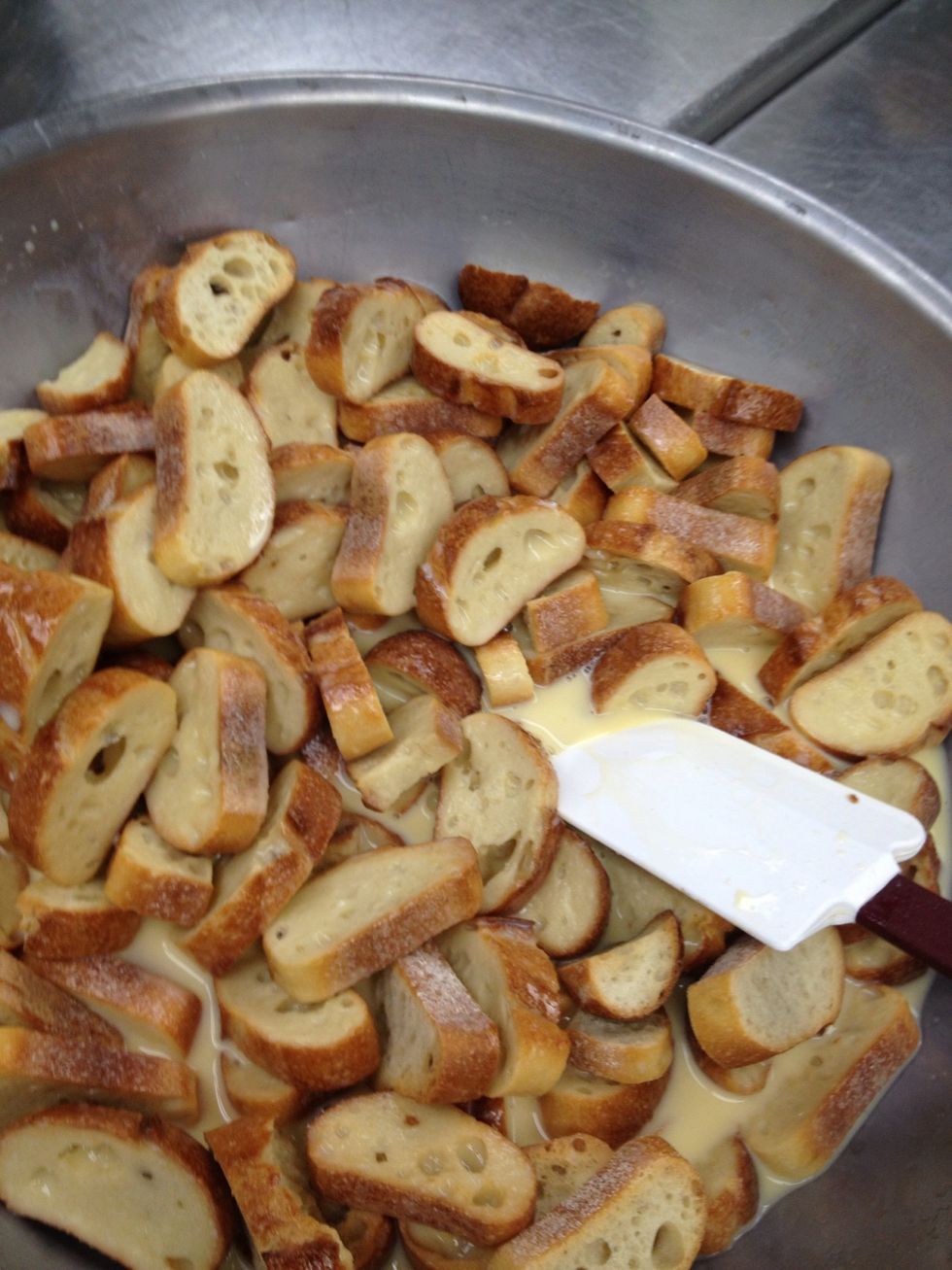 Pour mix over bread and allow to soak in.