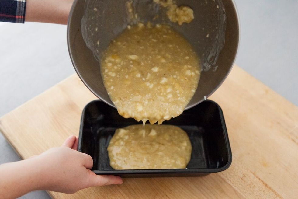 Pour mixture in greased bread pan. Make sure it's evenly distributed.
