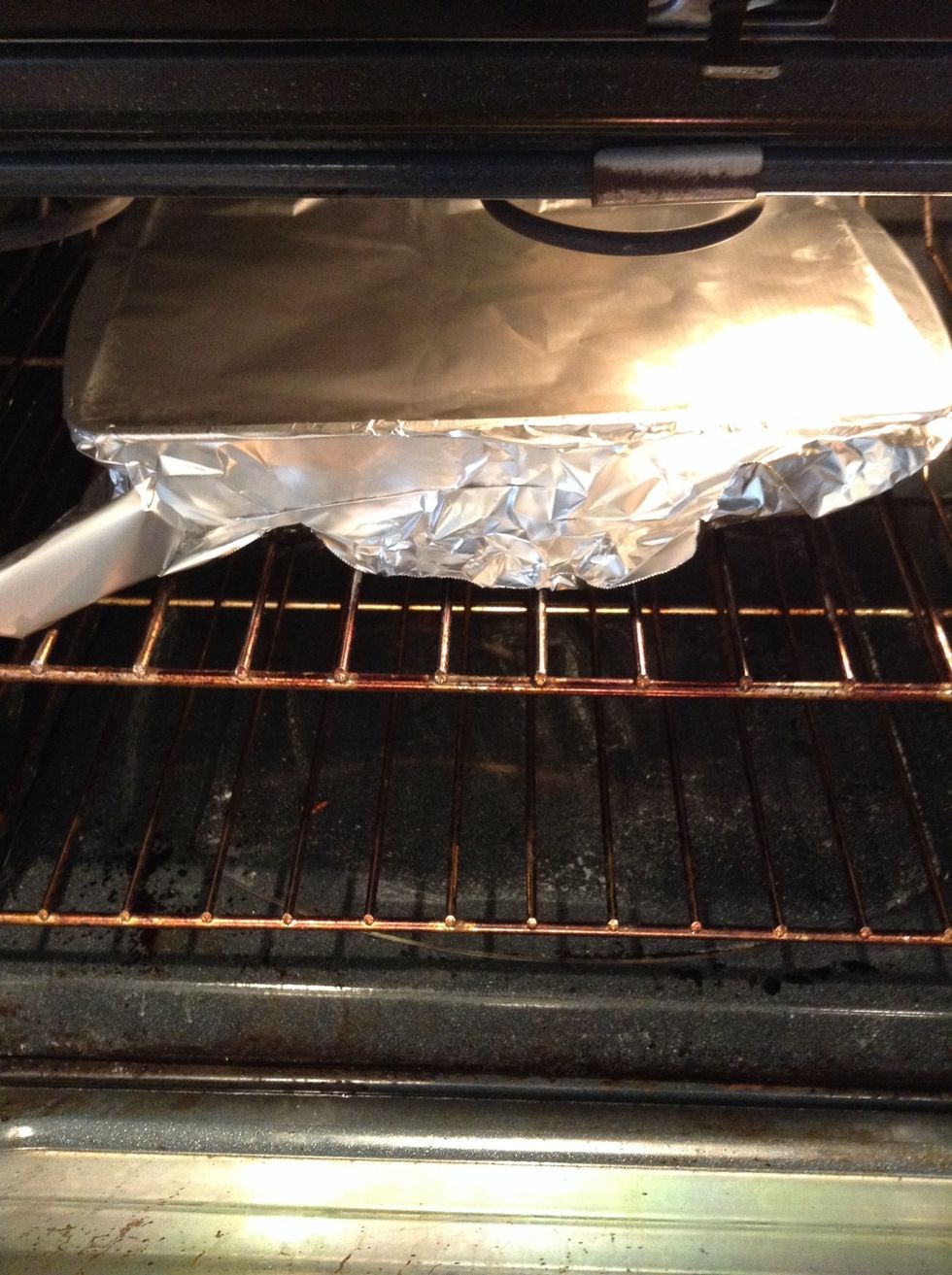 Pour mixture into butter greased pan. Cover with foil and bake for 30 minutes.