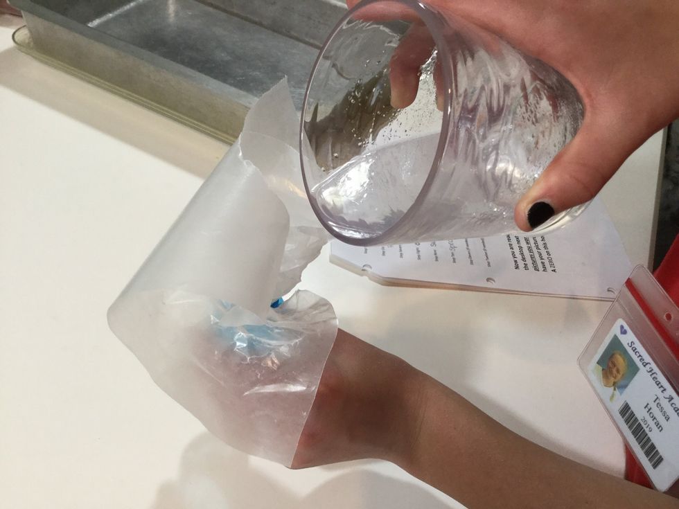 pour mixture into empty spray bottle