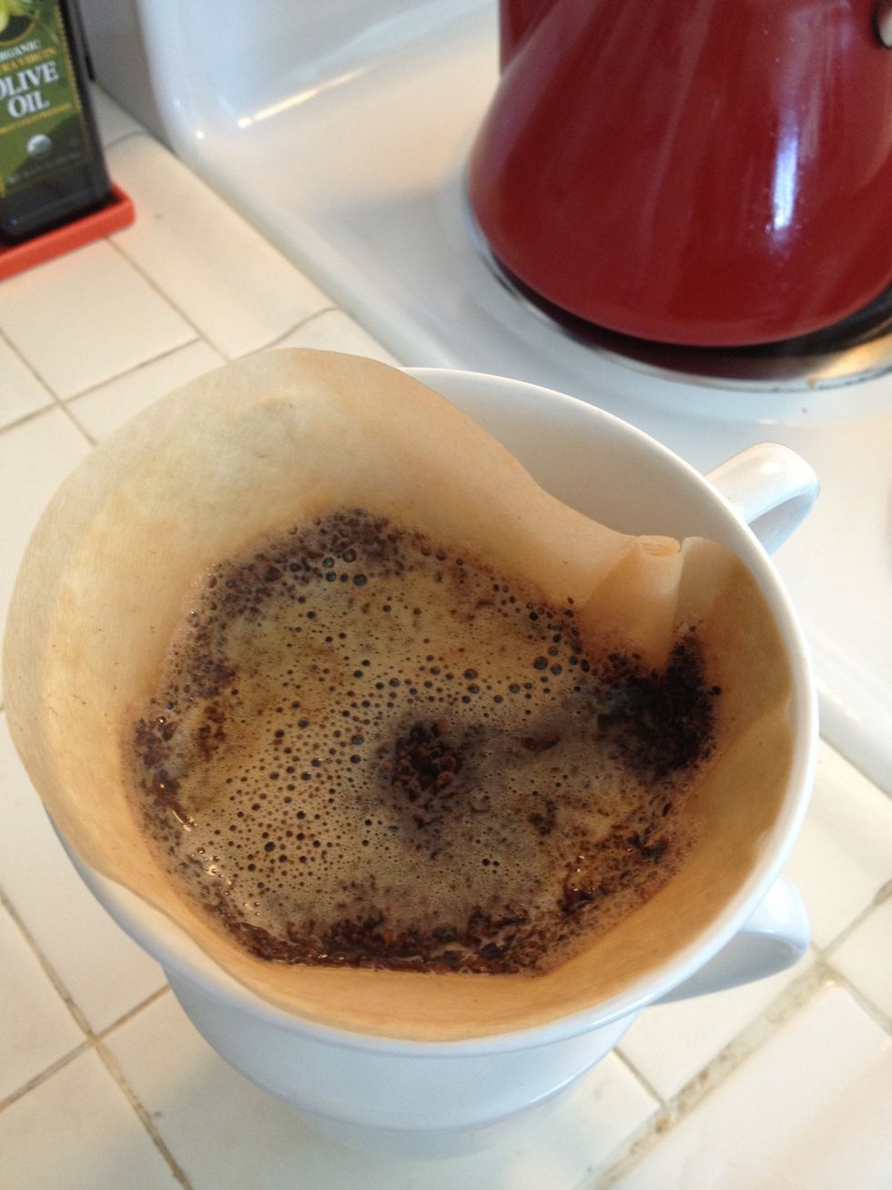 Pour more water onto the beans to fill in a circular motion.