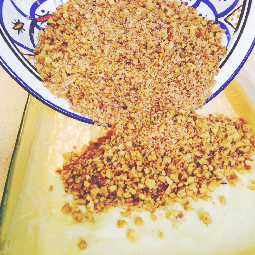 Pour nut mixture on top of the 20 layers of buttered FILO dough.