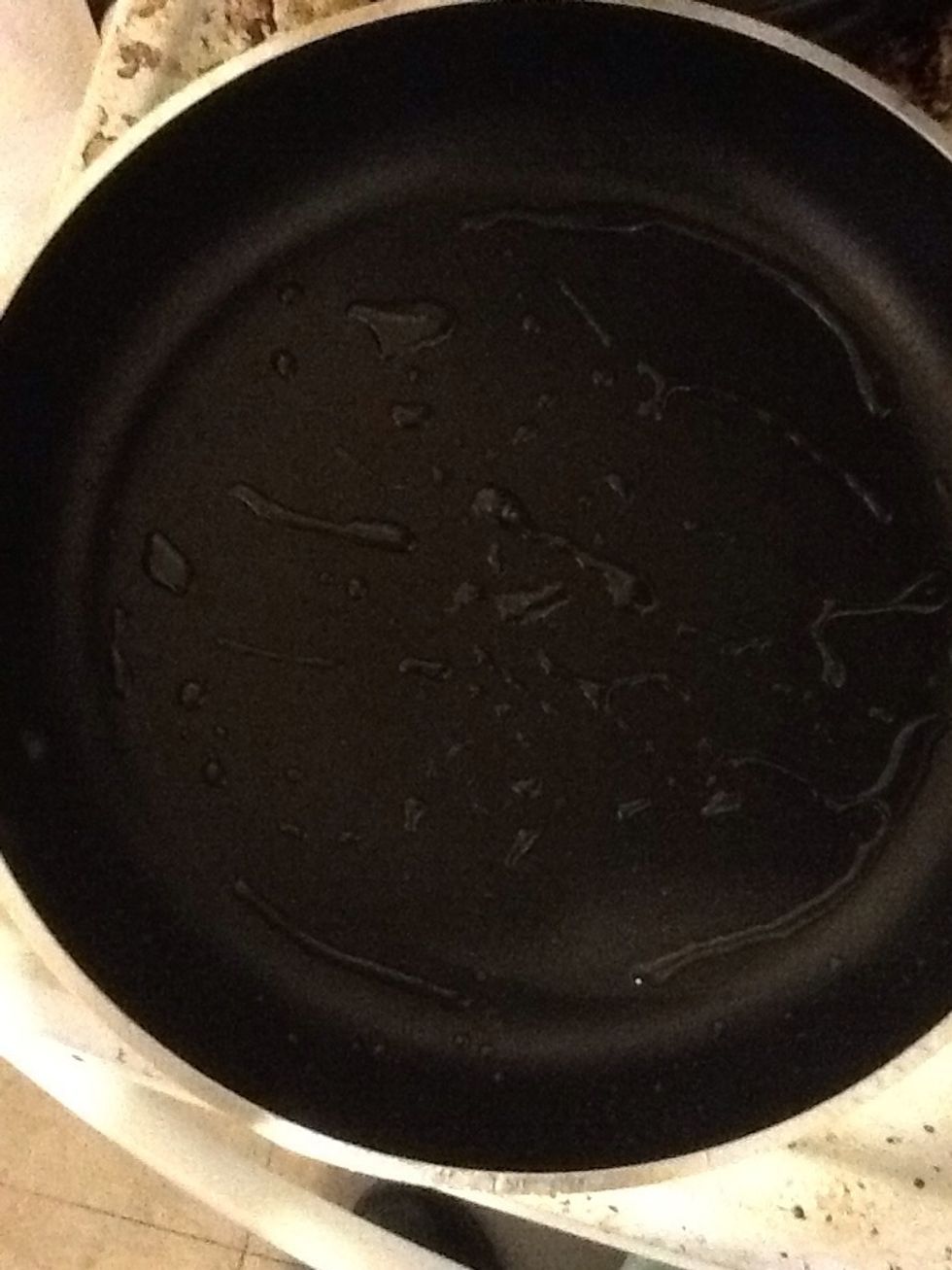 Pour oil onto a pan....