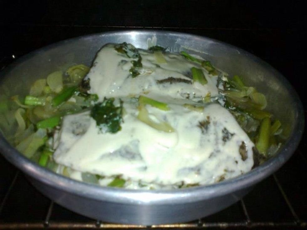 Pour on the fish the tahini which dissolved in it a little of water and lemon juice then put it into the oven for five minutes